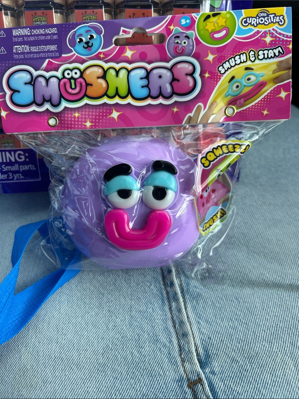 Usher Smusher Squishy Character - Purple with Pink Mouth and Blue Eyelids
